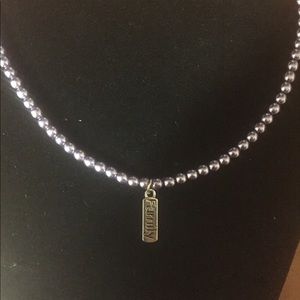 Ladies Glass Pearl Necklace.